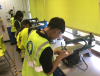 Children using high tech equipment ready for their KS3 learning.