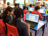 Children using software to create CADs.